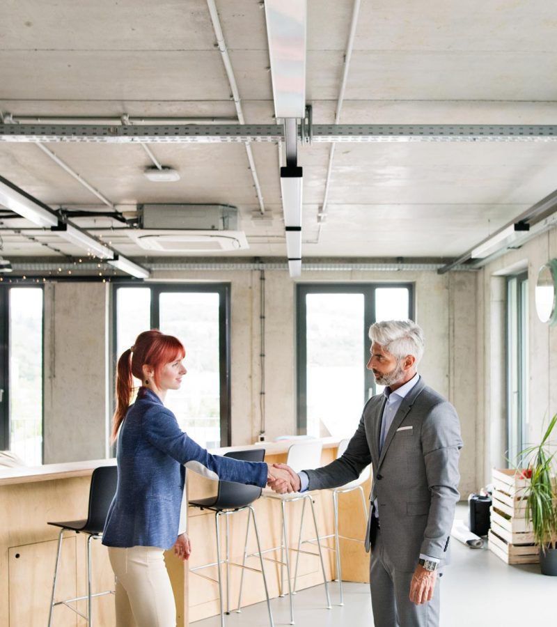 two-business-people-in-the-office-shaking-hands-PWRS4YC.jpg two-business-people-in-the-office-shaking-hands-PWRS4YC.jpg